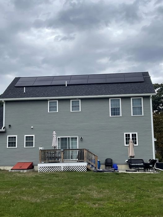 Completed solar installation from backyard view